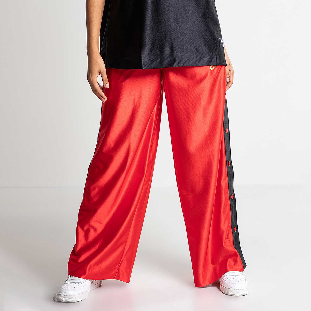 Stay stylish and comfortable in these Nike Sportswear Woven Tearaway  Basketball Pants